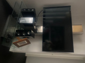 Gainsville glass tv unit inc tv