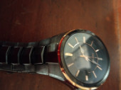 Seiko SNE516P is a gents black & rose gold sports dress watc